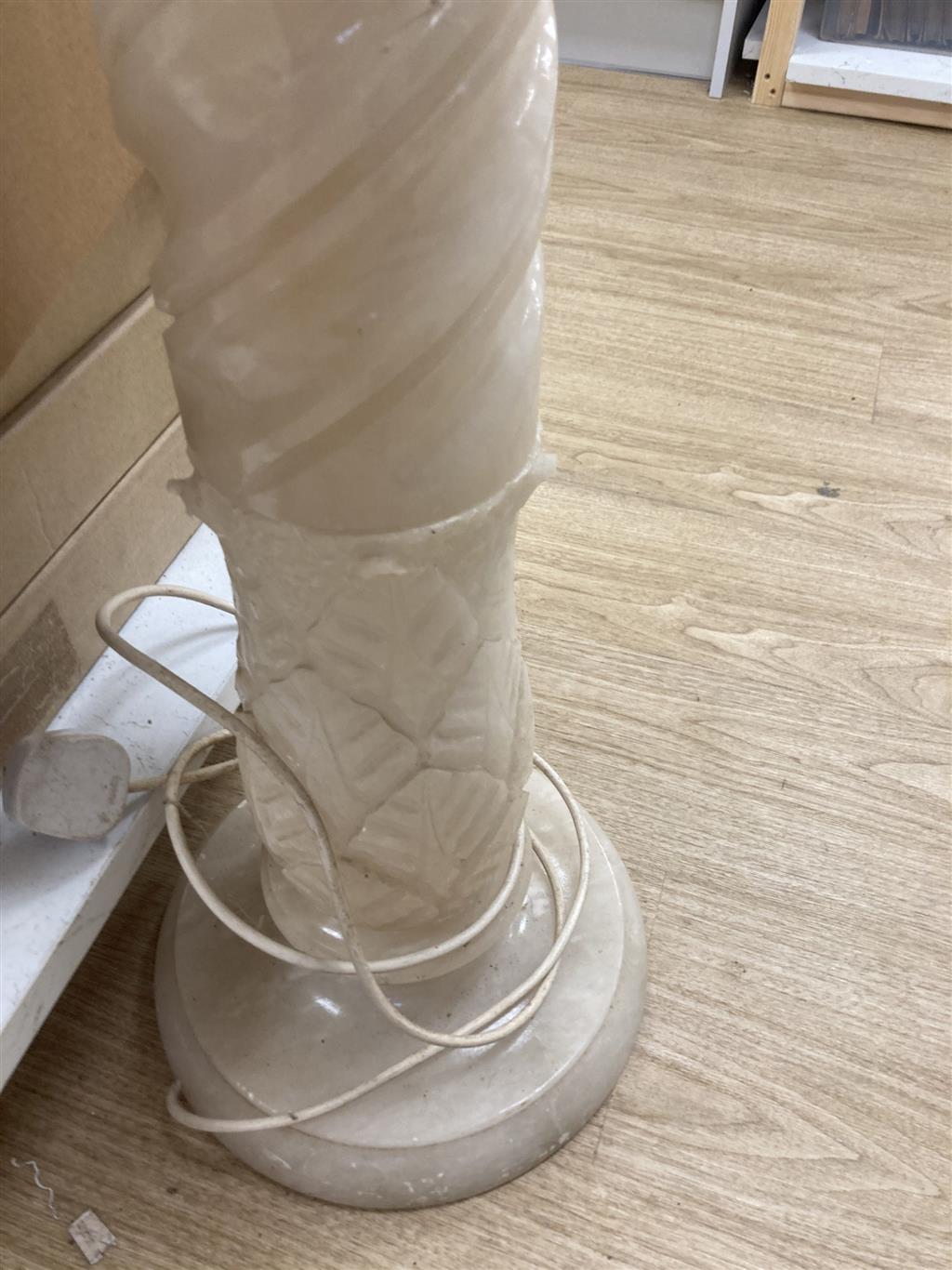 A white carved alabaster pedestal, 80cm high